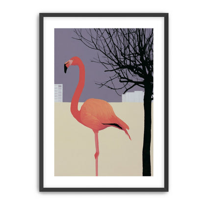 A flamingo beside the bare tree