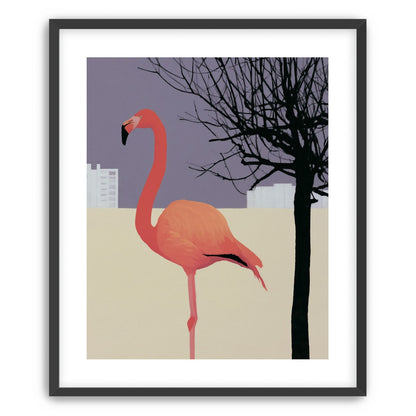 A flamingo beside the bare tree