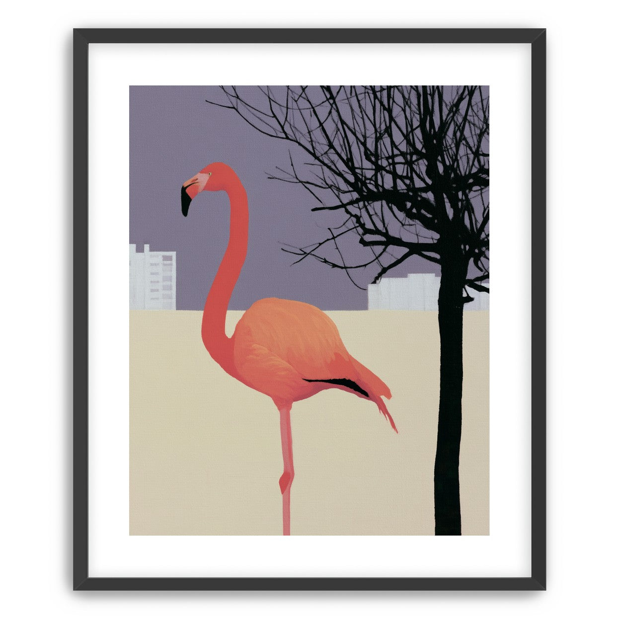 A flamingo beside the bare tree
