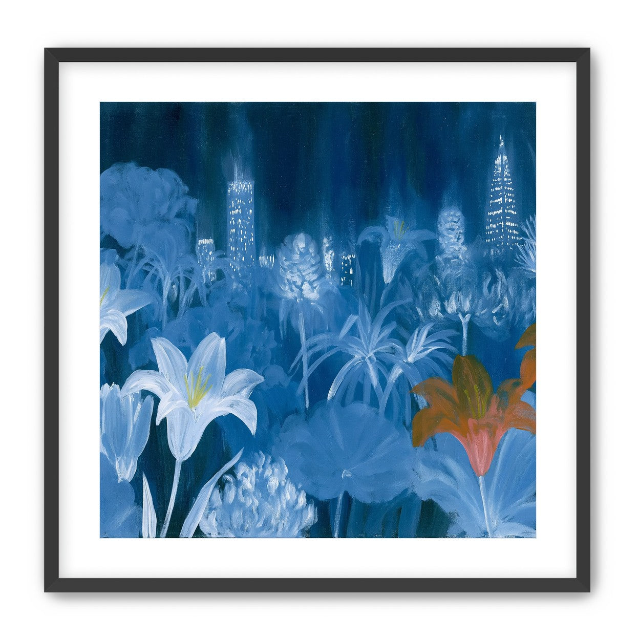 City lights behind lilies