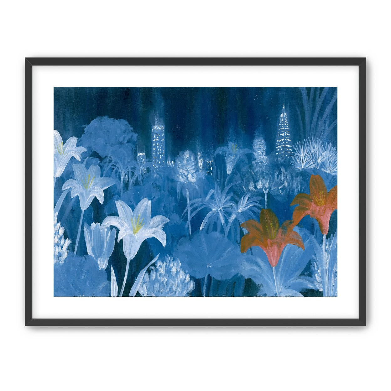 City lights behind lilies