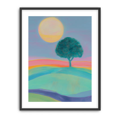 The sun behind the tree
