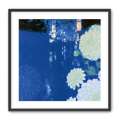White blooms on blue canal