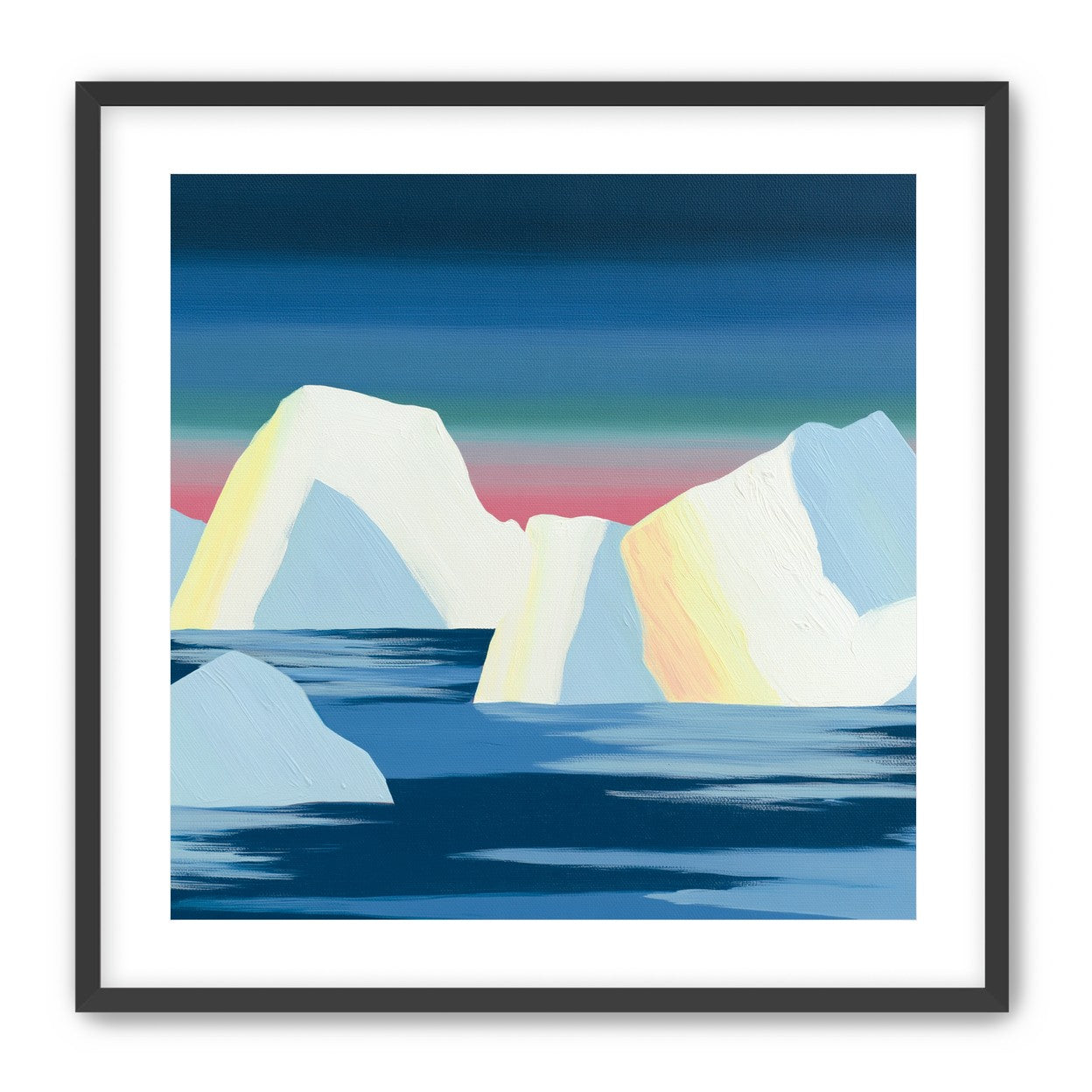 Icebergs under a pink banded sky