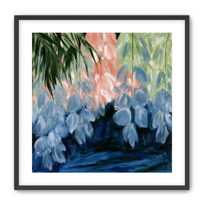 Blue flowers under green leaves