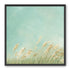 Turquoise sky over pale grass