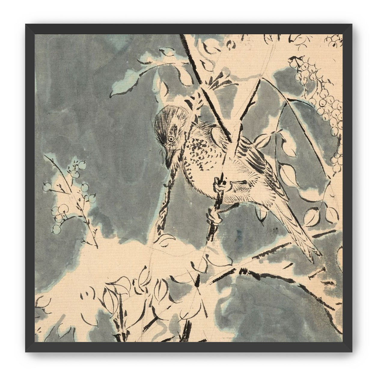 Quiet bird in berry branches