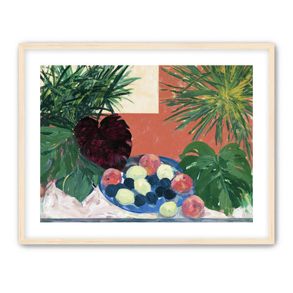 Coral wall behind green leaves
