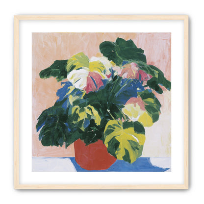 Red pot under heavy leaves