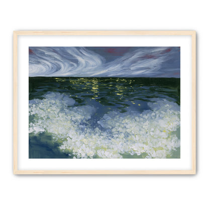 Foam and starlight at sea