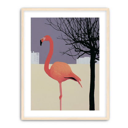 A flamingo beside the bare tree