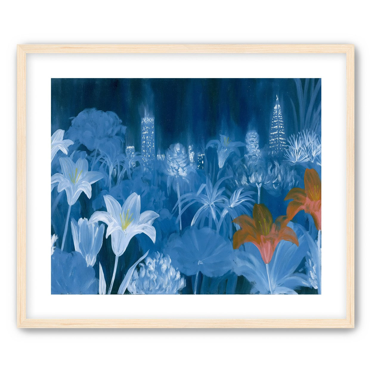 City lights behind lilies