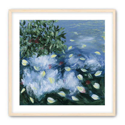 Petals across the blue water