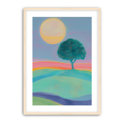 The sun behind the tree