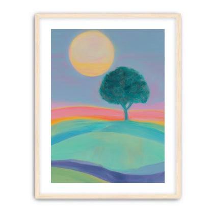 The sun behind the tree