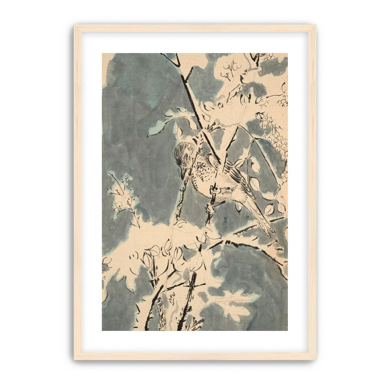 Quiet bird in berry branches