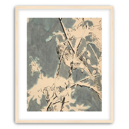 Quiet bird in berry branches
