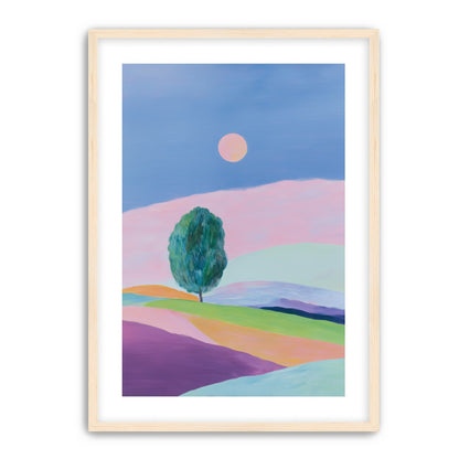 A pale sun above hills