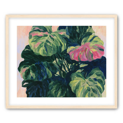 Pink light on green leaves