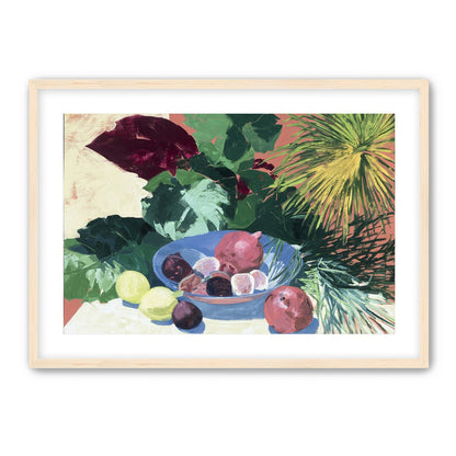 Blue bowl under palm frond