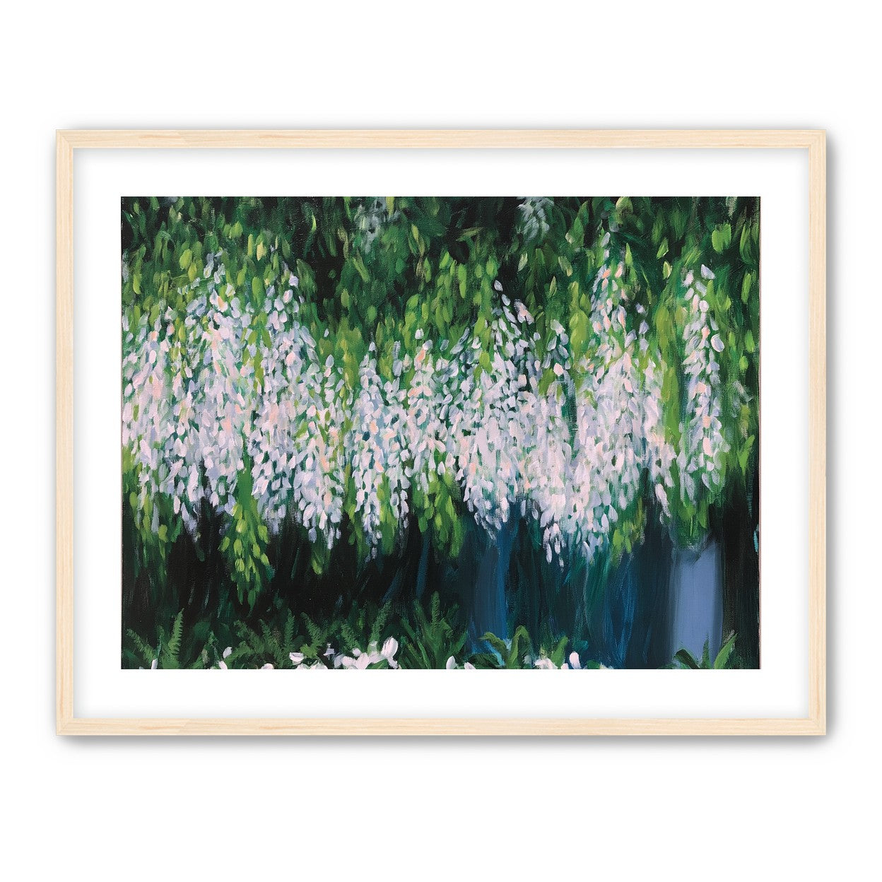 Pale blossoms in green shade