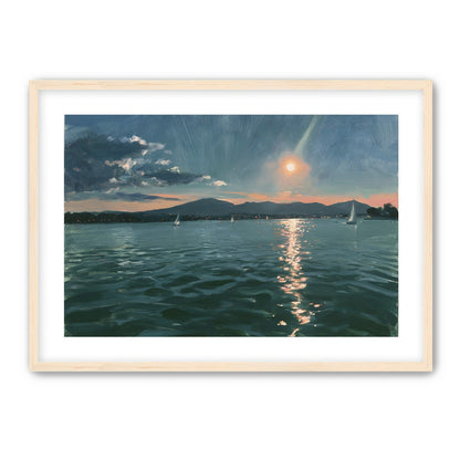 Peach sun on blue water