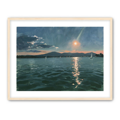 Peach sun on blue water