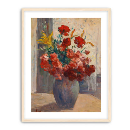 Flowers within a tall vase