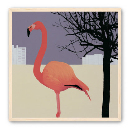 A flamingo beside the bare tree