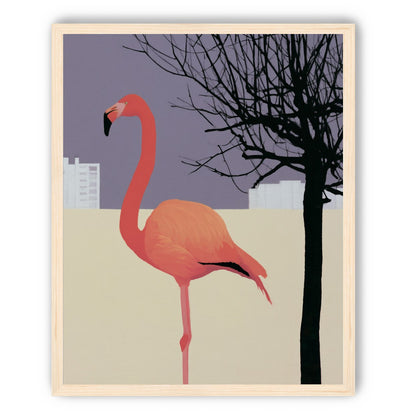 A flamingo beside the bare tree