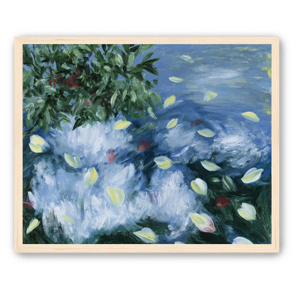 Petals across the blue water