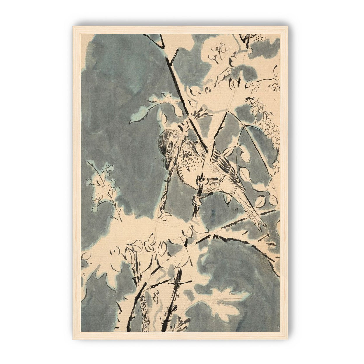Quiet bird in berry branches