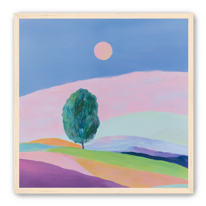 A pale sun above hills
