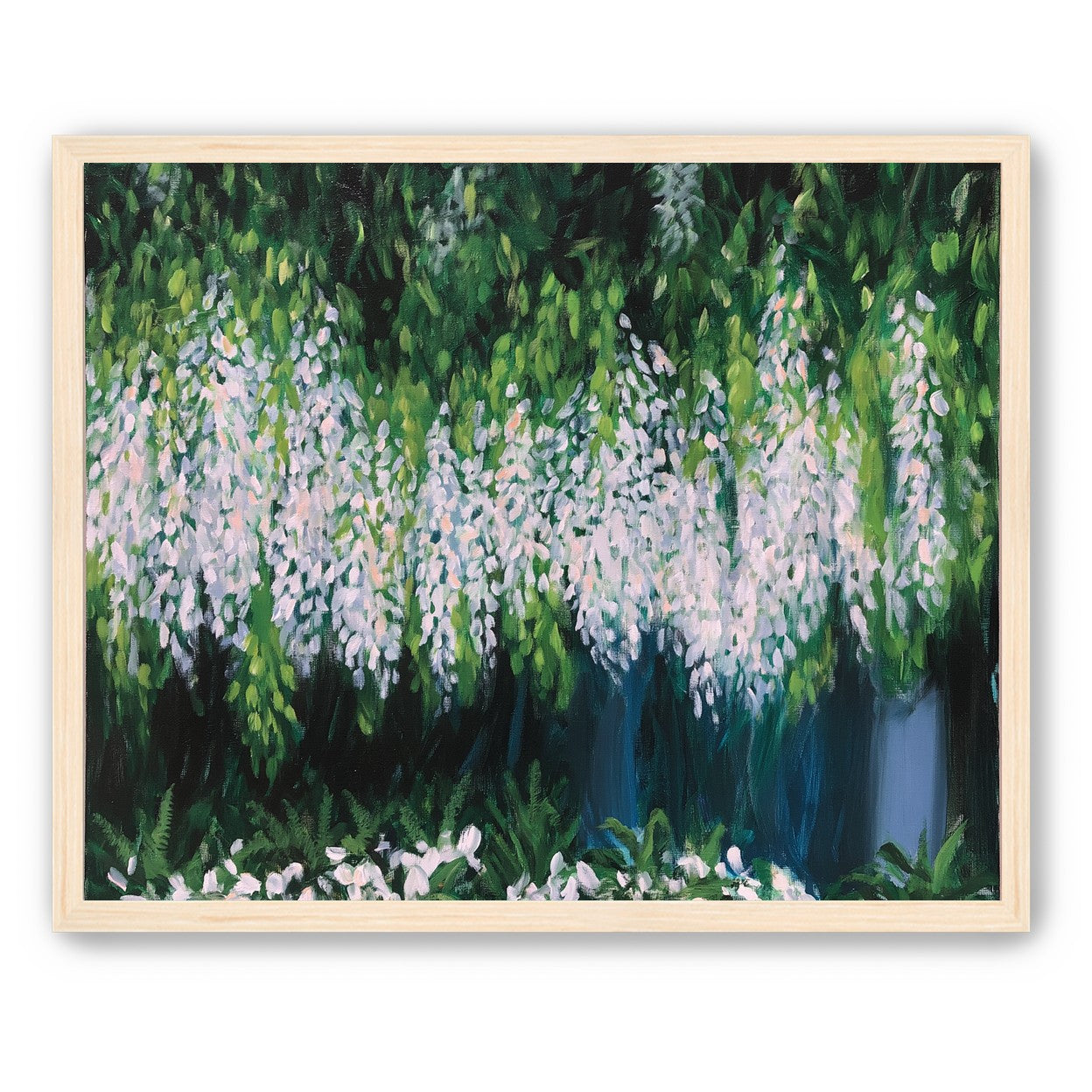 Pale blossoms in green shade
