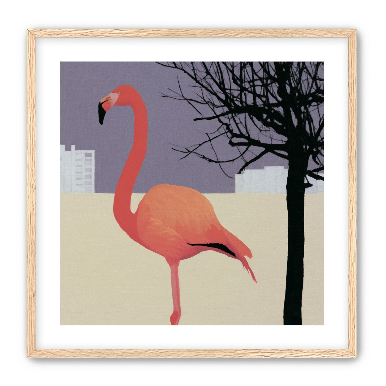 A flamingo beside the bare tree