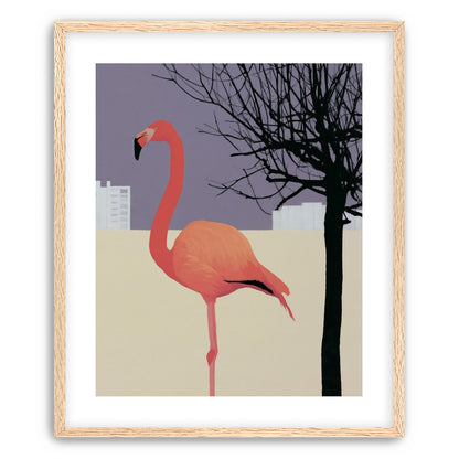 A flamingo beside the bare tree