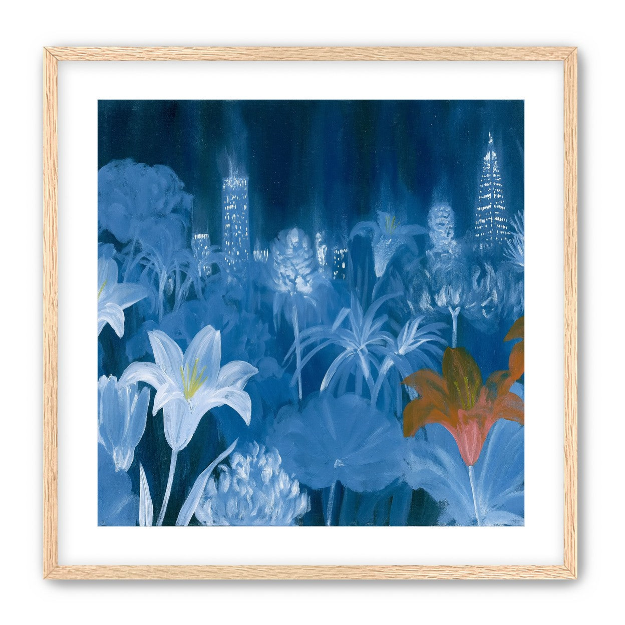 City lights behind lilies