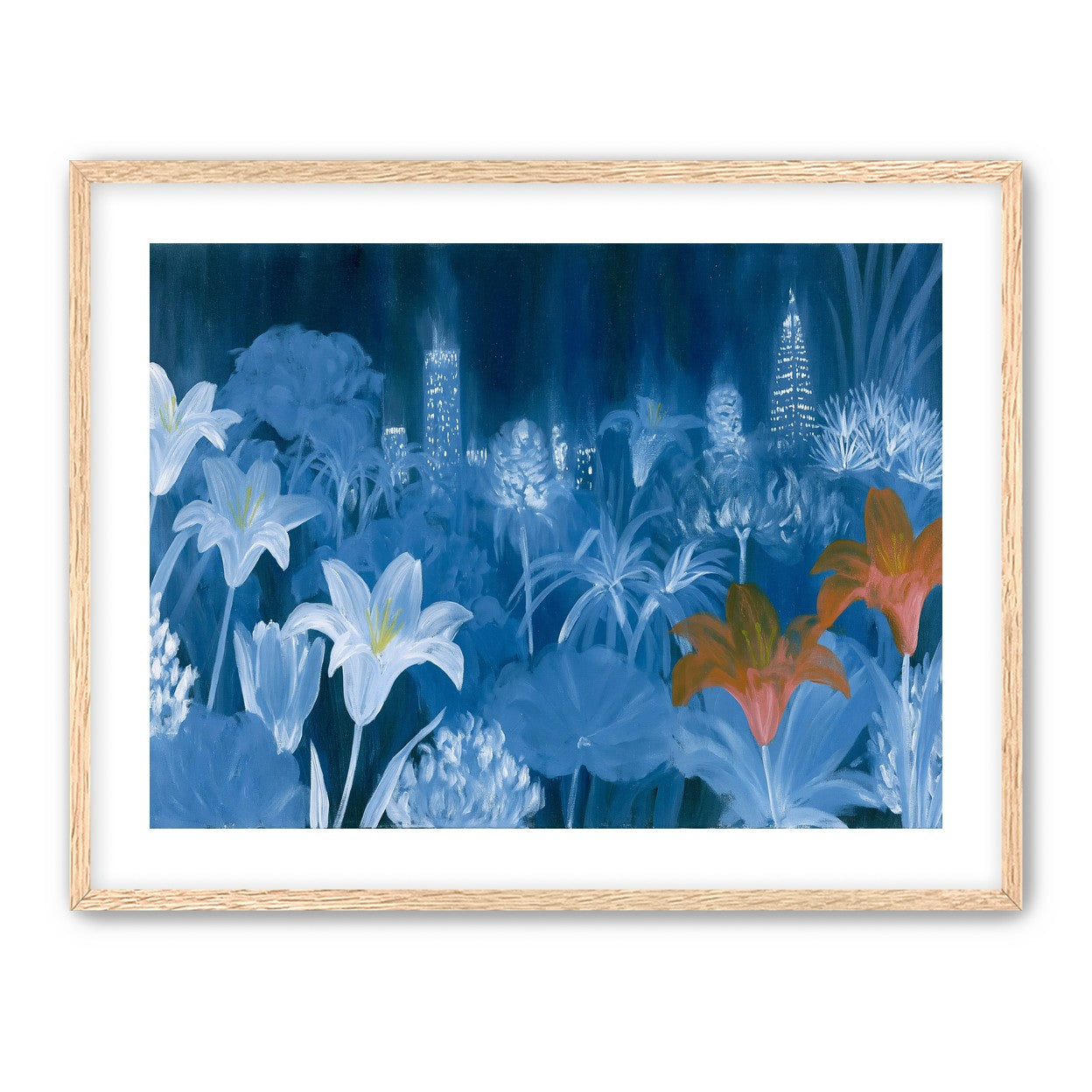 City lights behind lilies