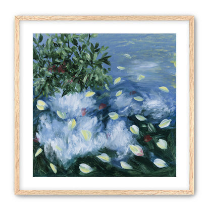 Petals across the blue water