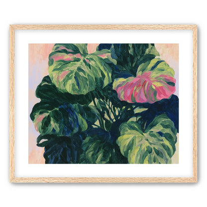 Pink light on green leaves