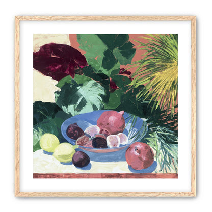 Blue bowl under palm frond