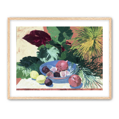 Blue bowl under palm frond