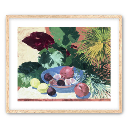 Blue bowl under palm frond