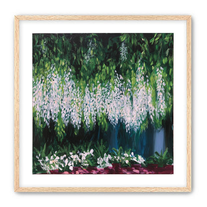 Pale blossoms in green shade