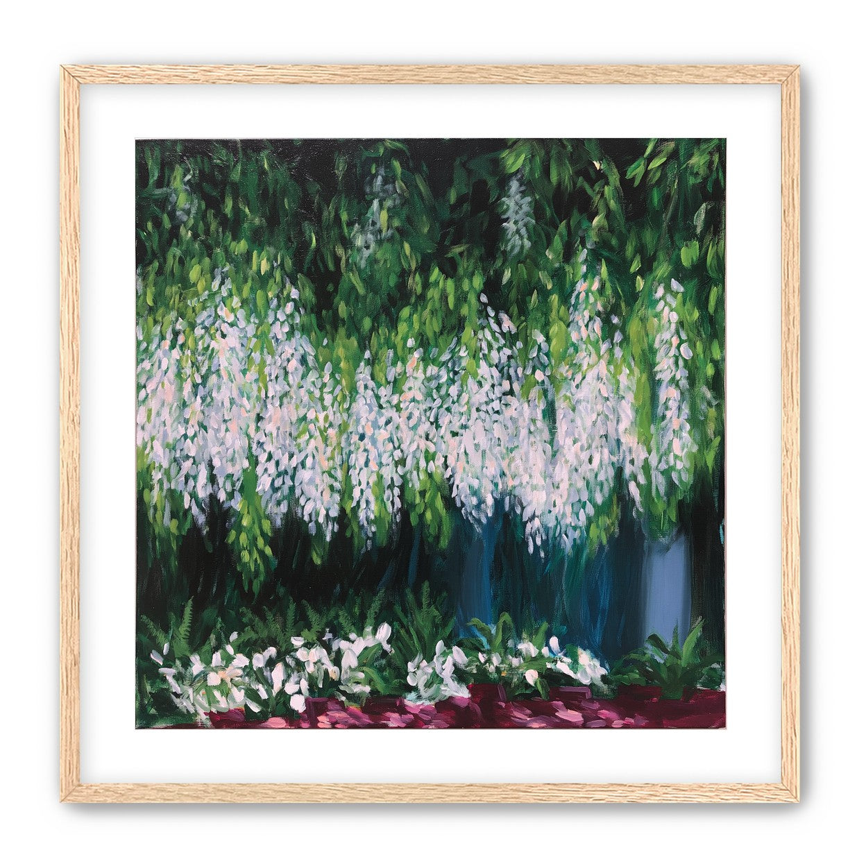Pale blossoms in green shade
