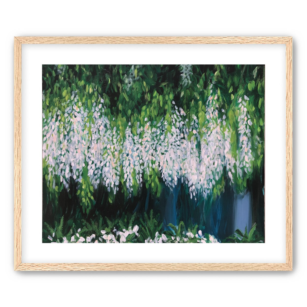 Pale blossoms in green shade