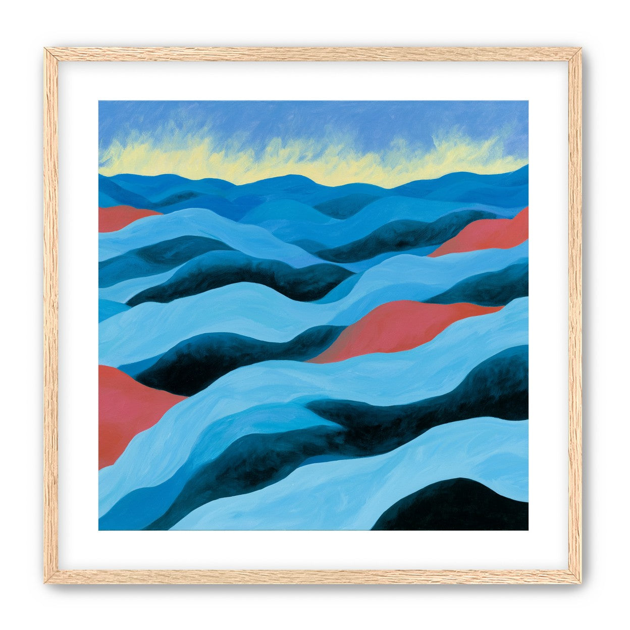 Blue hills under pale sky