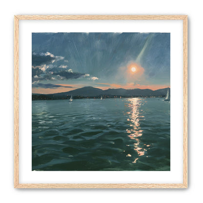 Peach sun on blue water