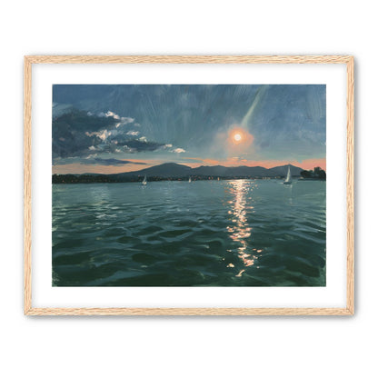 Peach sun on blue water