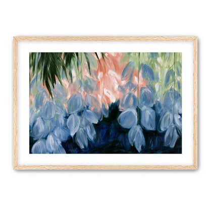 Blue flowers under green leaves